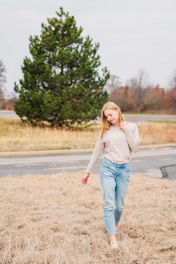 Girl walks towards the camera.