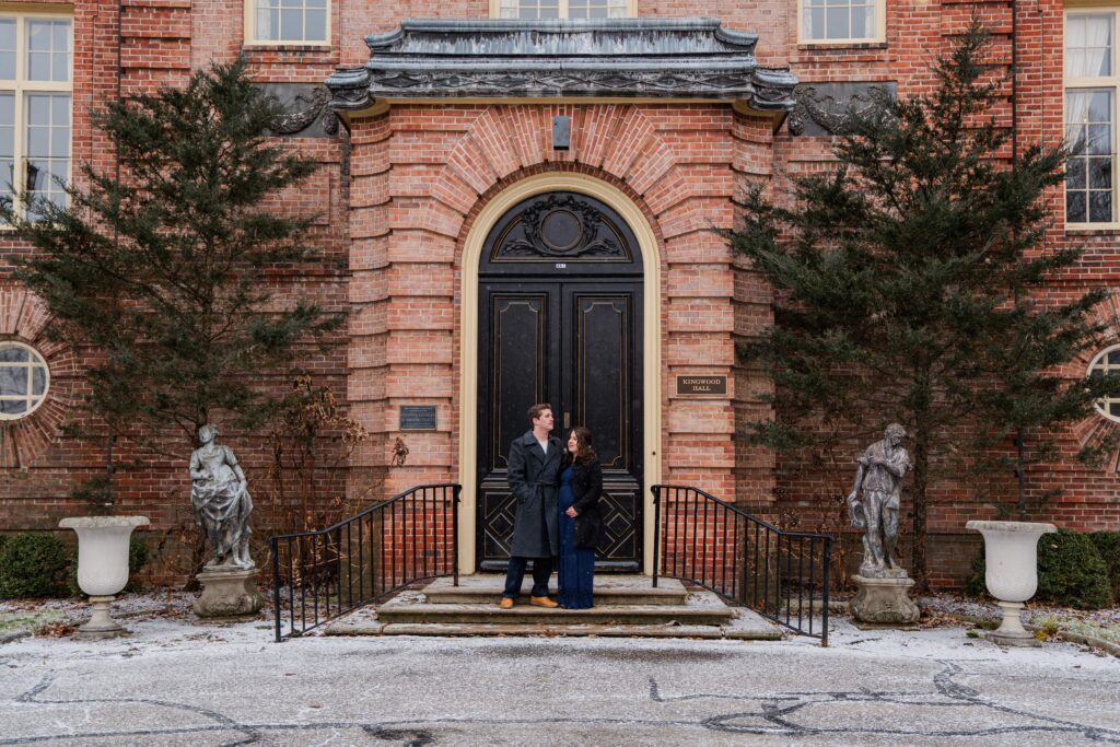 Couple stands in front of Kingwood Hall in Kingwood Center Gardens, Mansfield, OH.