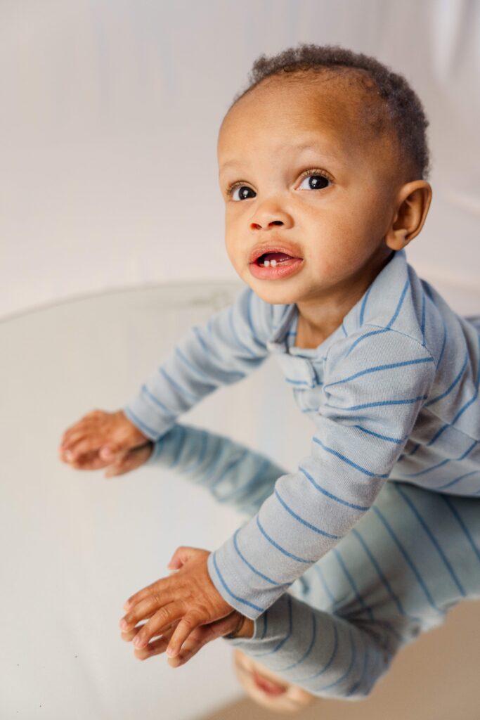 Baby looks at the camera.